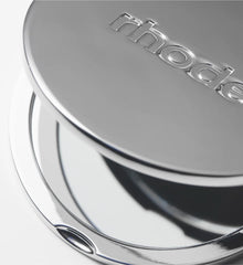 The Compact Mirror